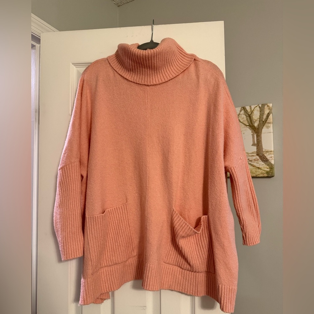 LOFT sweater. Size large. Rusty pink color with pockets and a cowl neck.